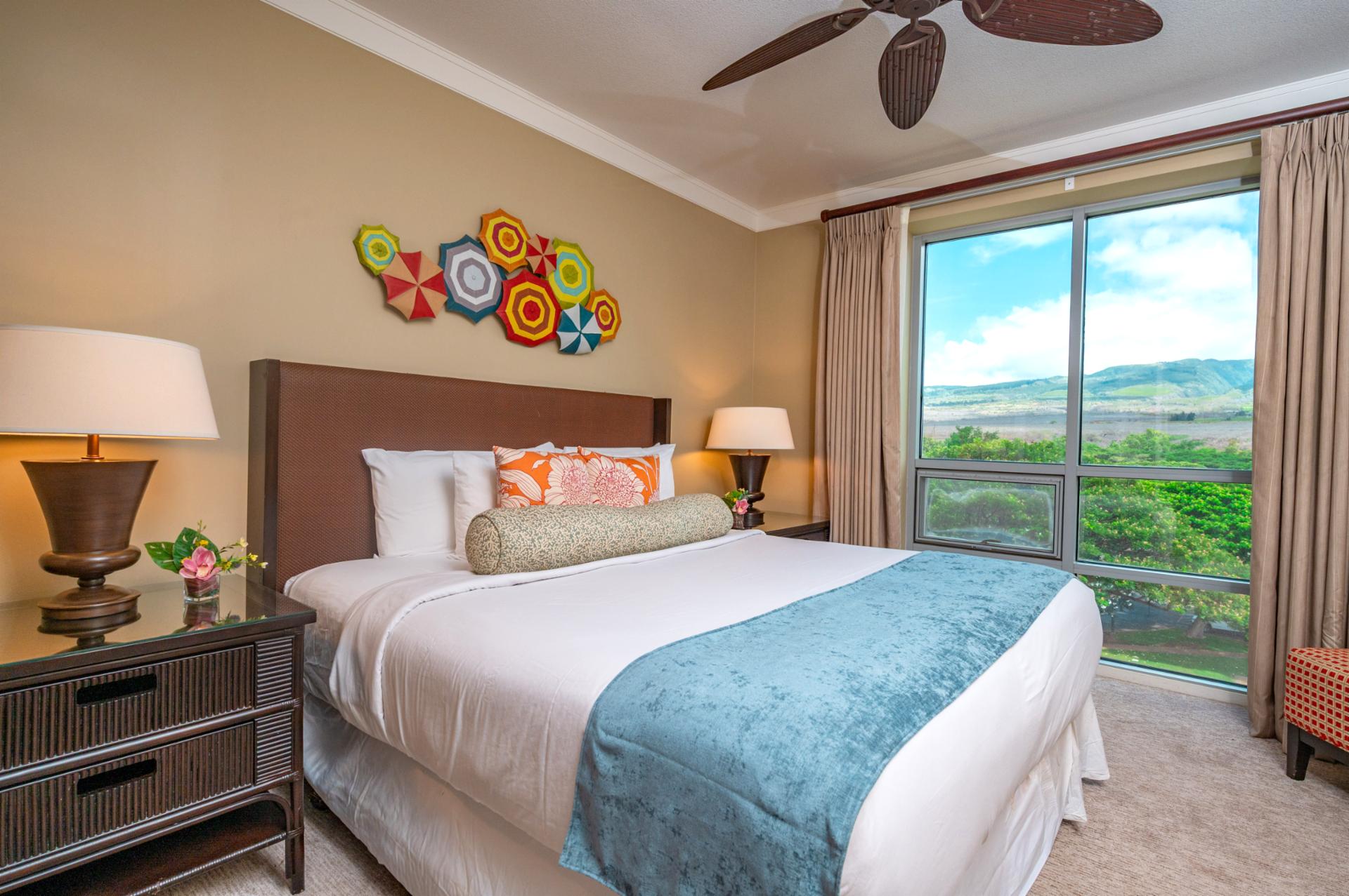 Wake up to views of the West Maui Mountains from your King bed in this vibrant guest room filled with natural light.