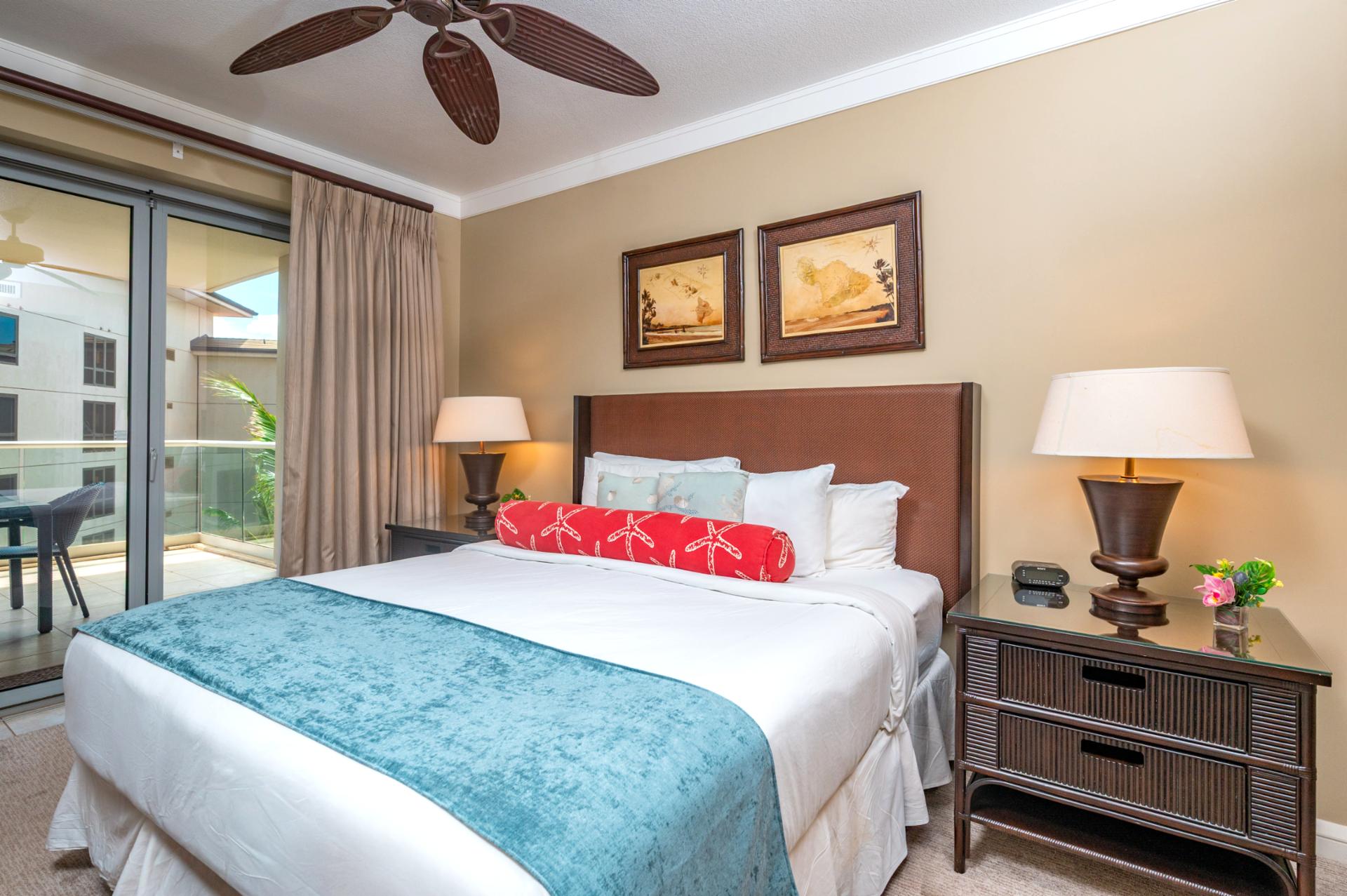 Rest easy in your primary suite with a King bed, direct lanai access, and warm tropical decor for a restful Maui retreat.