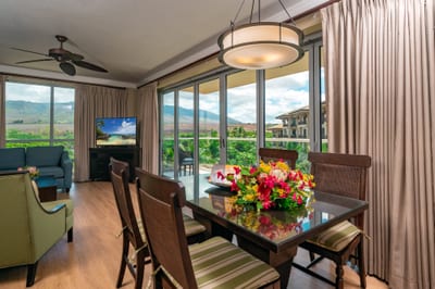 Open the sliding doors and let the island breeze flow through your dining and living space, framed by stunning mountain and resort views. HKH-520