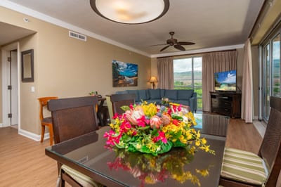 Enjoy meals and conversation in the open-concept dining and living area, with plenty of natural light and views of the West Maui Mountains. HKH-520