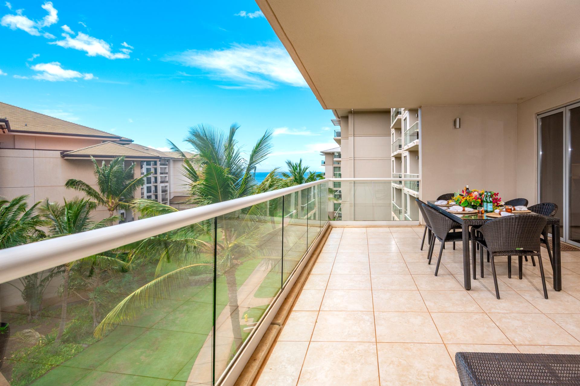 Dine outdoors with peekaboo ocean views and the sound of swaying palms, all from the comfort of your spacious covered lanai.
