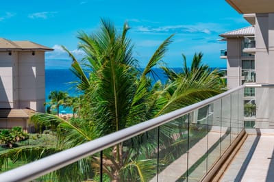 Take in blue ocean views beyond the palms from your private lanai, a peaceful space to start or end your Maui day. HKH-520