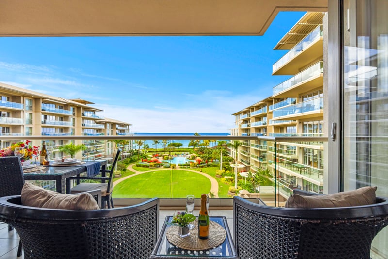 Resort views and plush seating make this balcony ideal for slow mornings and starlit evenings. HKH-529