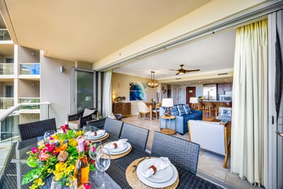 Spacious and shaded, this balcony offers a comfortable lounge area with views of the resort below. HKH-529
