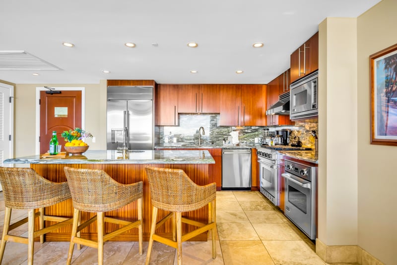 Cook, gather, and share stories around the island in your open kitchen, complete with modern finishes and full amenities. HKH-529