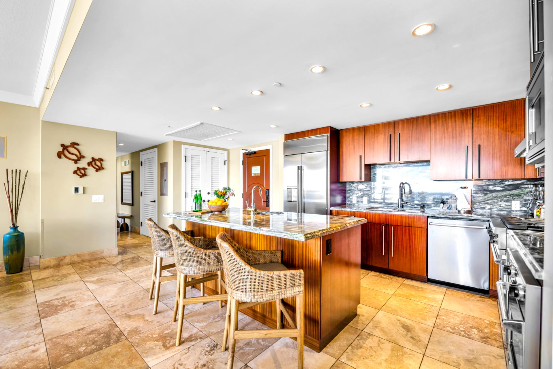 Island-inspired design meets function in this fully stocked kitchen with ample prep space and bar seating.