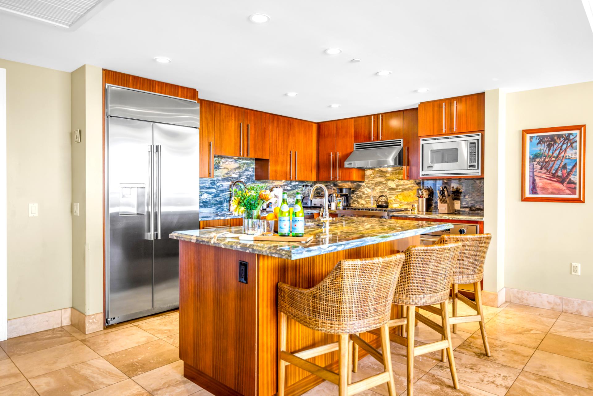 Everything you need is at your fingertips in this stylish kitchen with stainless appliances and breakfast bar.