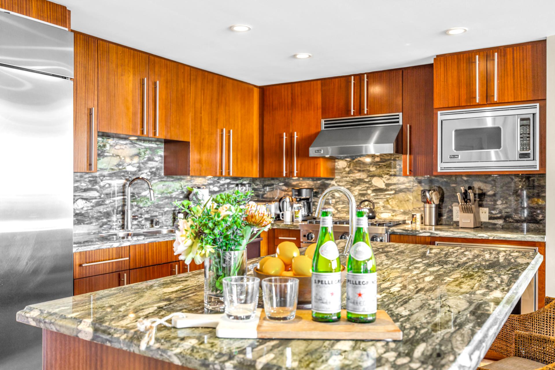 Granite countertops and quality finishes elevate your kitchen experience for nights in or breakfast before adventures.