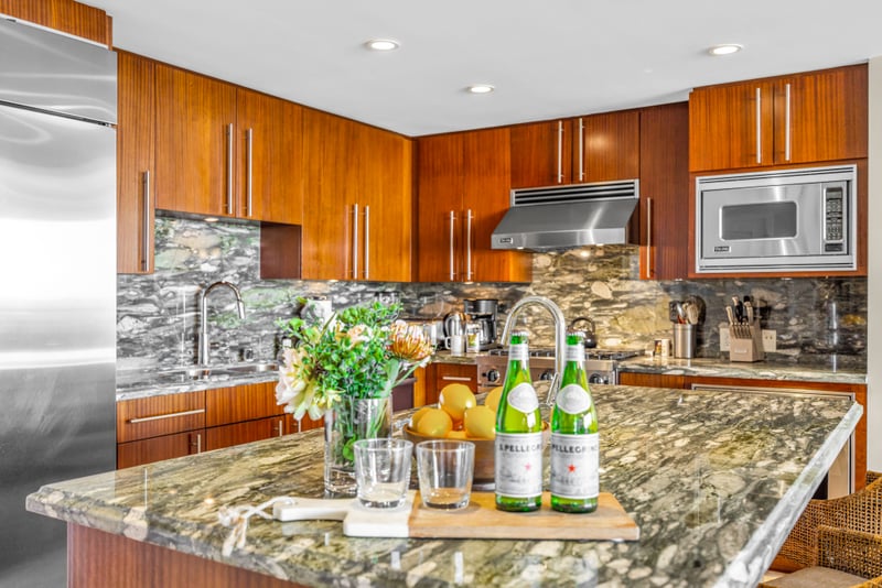 Granite countertops and quality finishes elevate your kitchen experience for nights in or breakfast before adventures. HKH-529