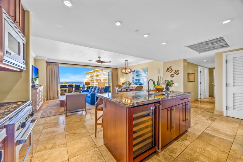 The open kitchen lets you chat with the group or catch a game on the TV while you prep dinner. HKH-529