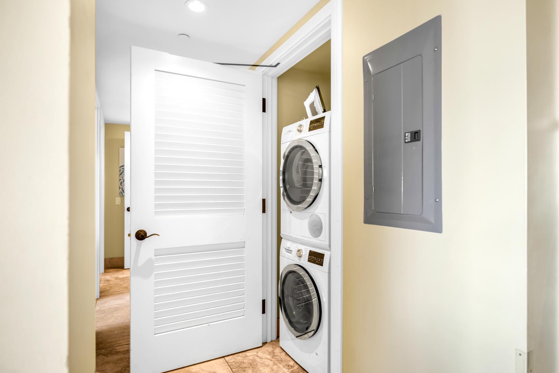 Enjoy the convenience of in-unit laundry with a full-size washer and dryer just off the hallway.