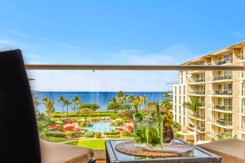 Sip cocktails with unobstructed ocean views from your balcony perch above Honua Kai's tropical grounds. HKH-529