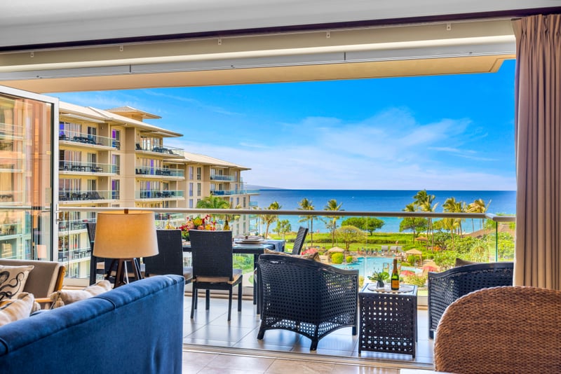 Elevated views of the ocean and resort make this balcony a favorite place to gather or unwind. HKH-529
