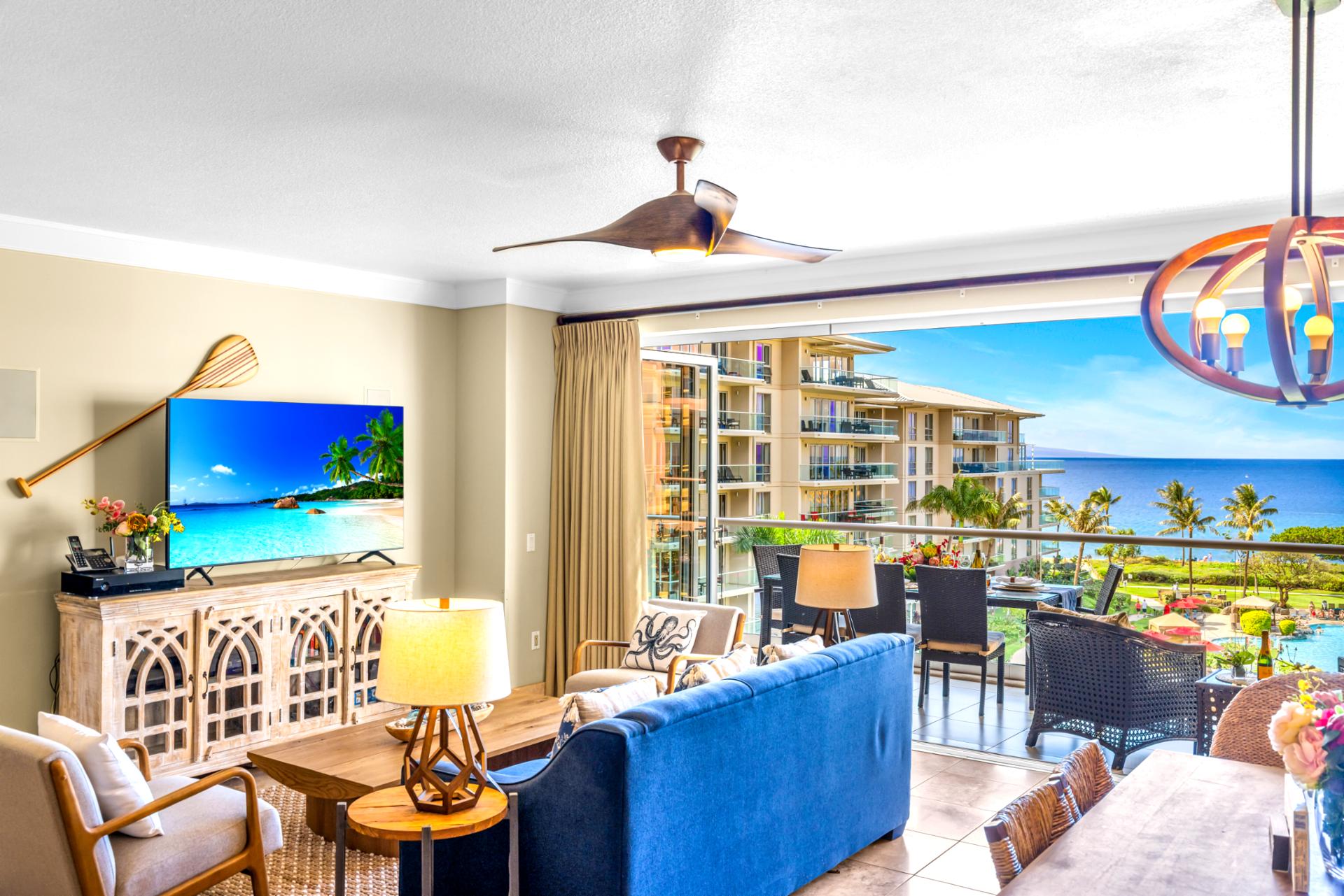 Enjoy a movie on the Smart TV with ocean views just outside your balcony doors.