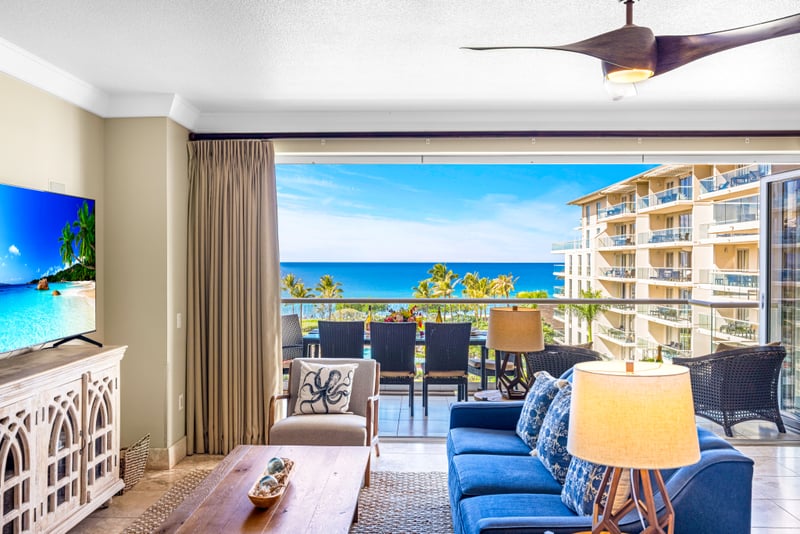 Bright and coastal, this living room invites conversation or a breezy retreat after sunset drinks on the balcony. HKH-529