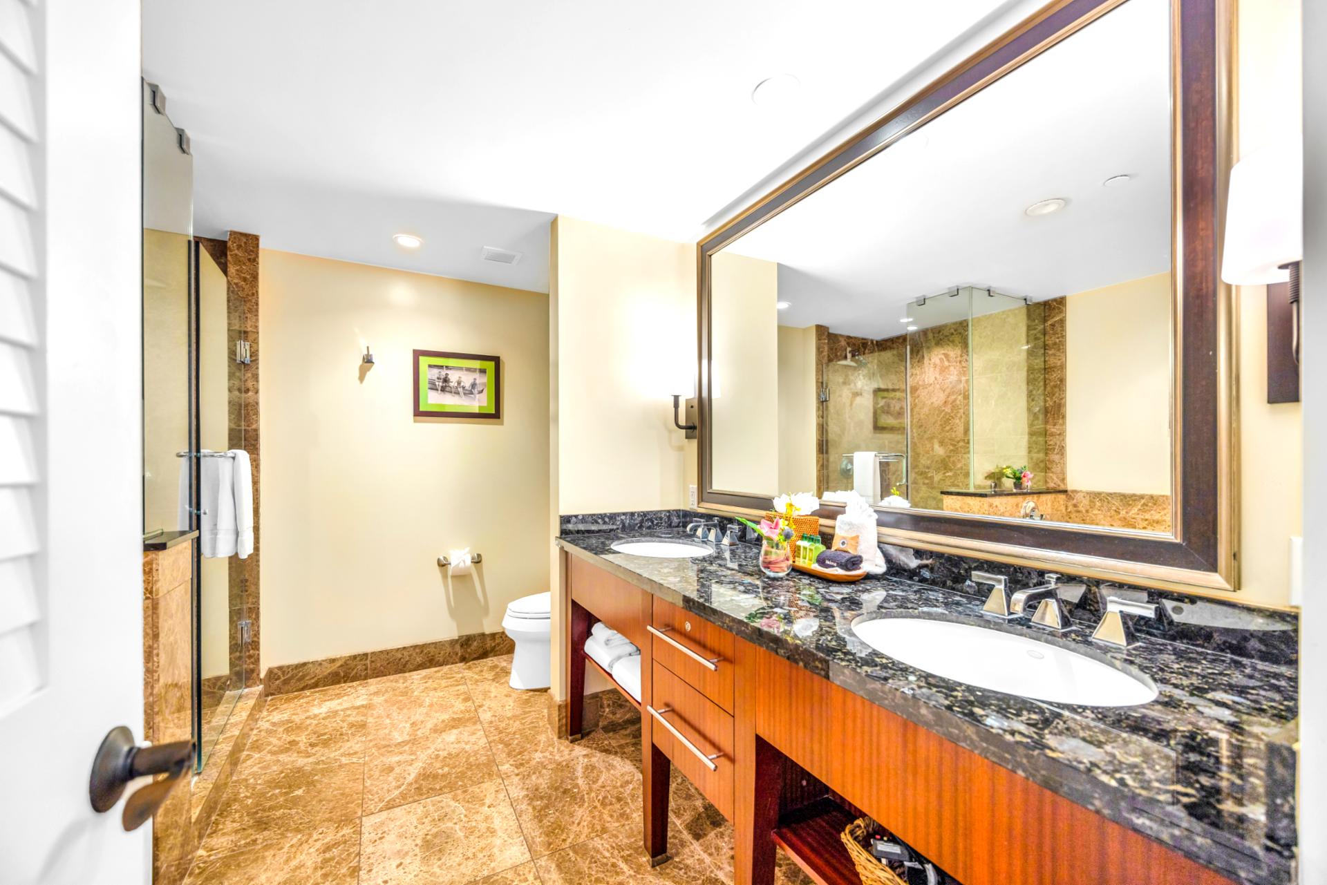 Your guest bath includes a granite dual vanity and thoughtful finishes for a comfortable refresh.