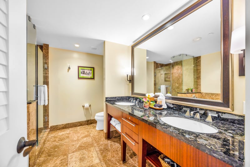 Your guest bath includes a granite dual vanity and thoughtful finishes for a comfortable refresh.