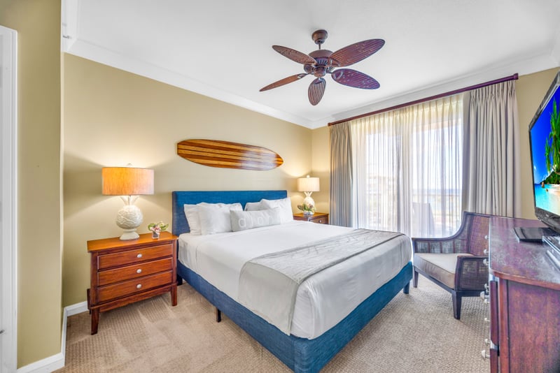 Your primary bedroom features a King bed, Smart TV, and blackout drapes for restful mornings after a late dinner on the balcony. HKH-529