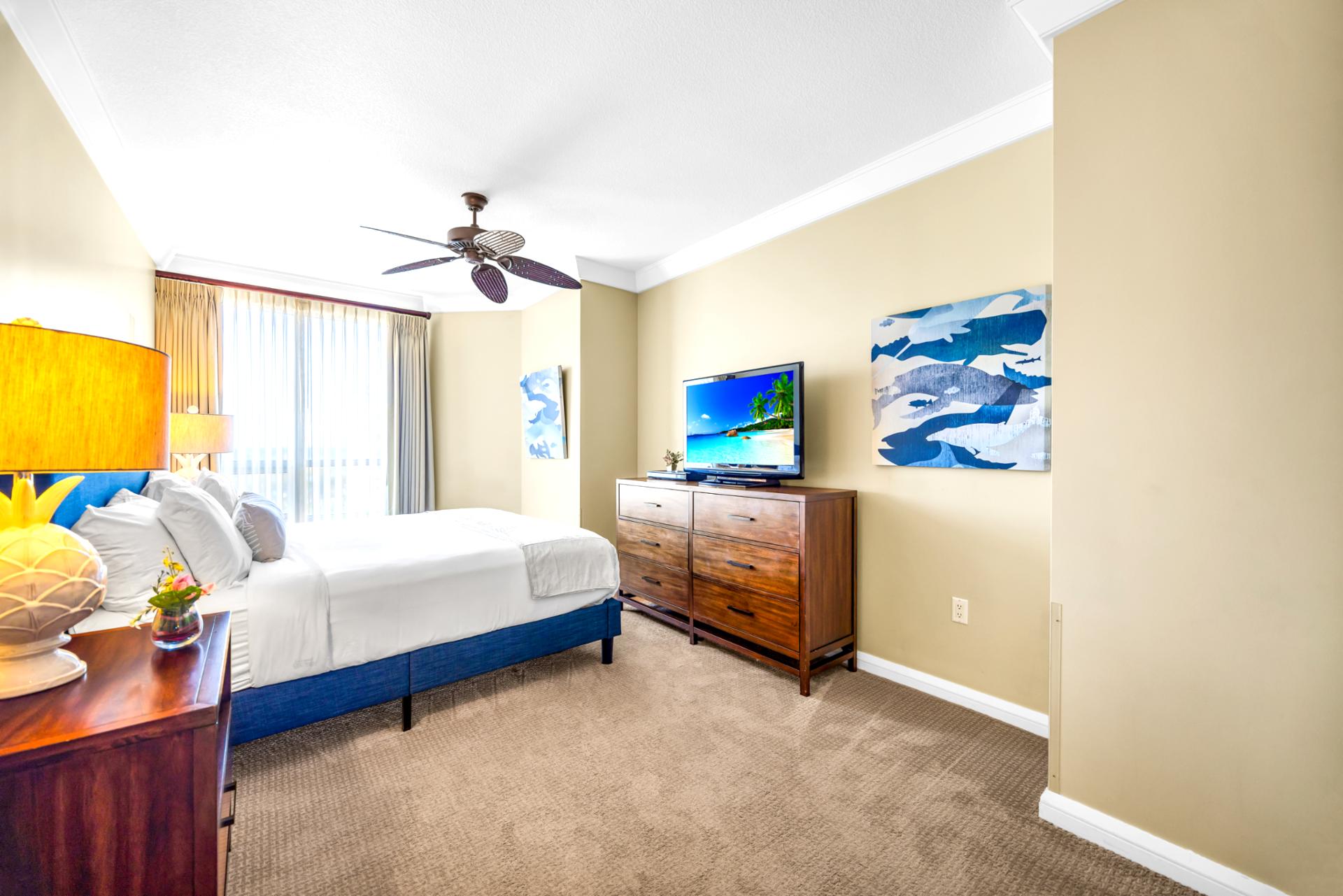 Cozy and calm, Guest Bedroom 1 includes a King bed and Smart TV for winding down your day.
