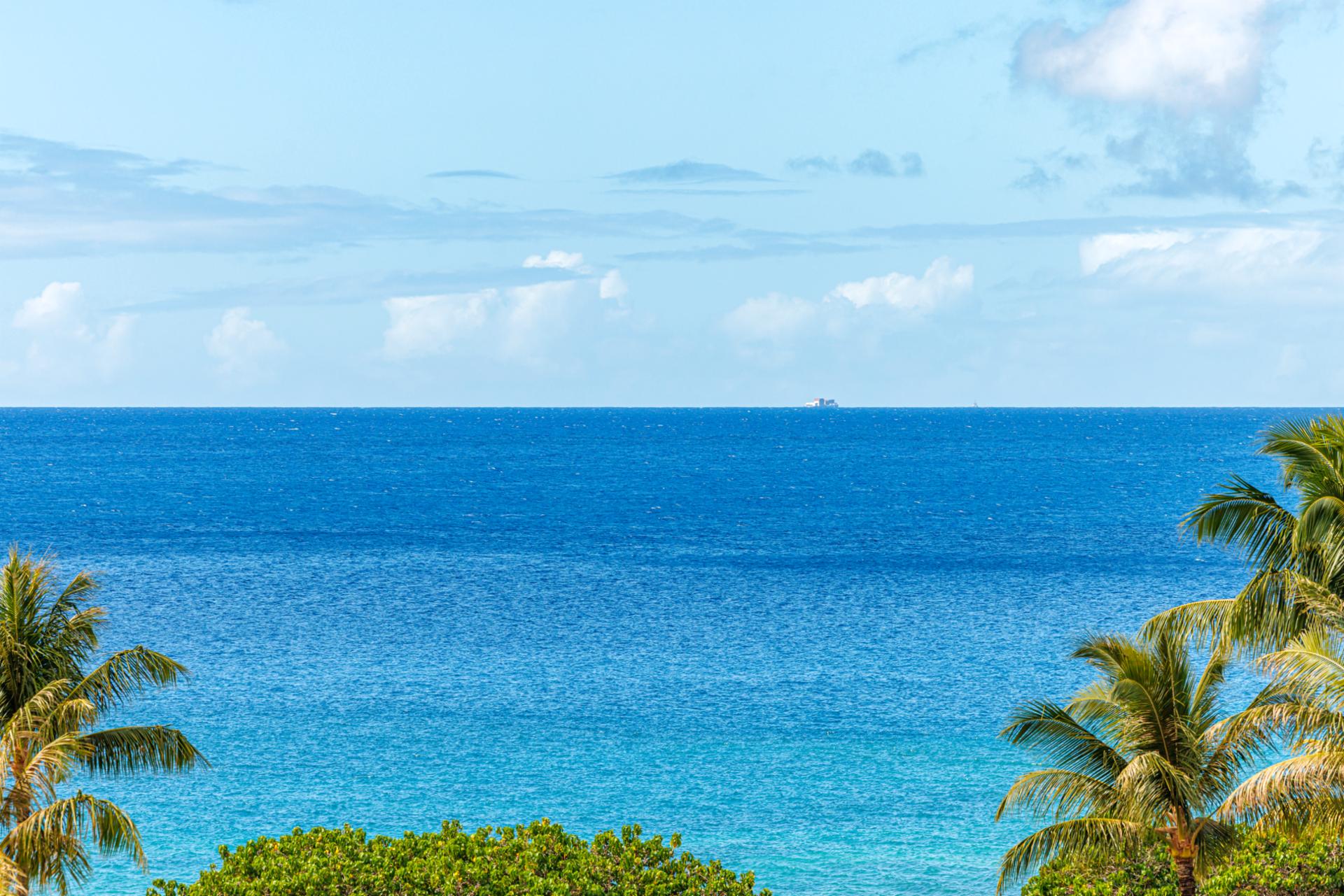 Ocean views stretch to the horizon, creating a perfect backdrop for coffee or cocktails.