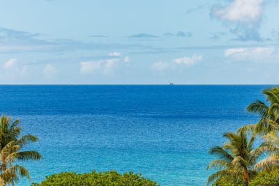 Ocean views stretch to the horizon, creating a perfect backdrop for coffee or cocktails. HKH-529