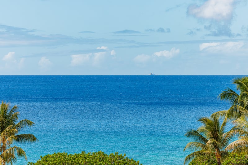 Ocean views stretch to the horizon, creating a perfect backdrop for coffee or cocktails. HKH-529