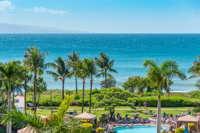 Enoy aqua marine views and cool shade breezes by the pool