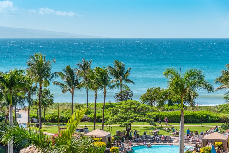 Enoy aqua marine views and cool shade breezes by the pool