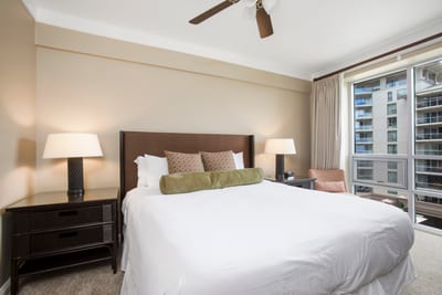 Bright, cozy bedroom with city views and luxurious king-sized comfort. HKH-545