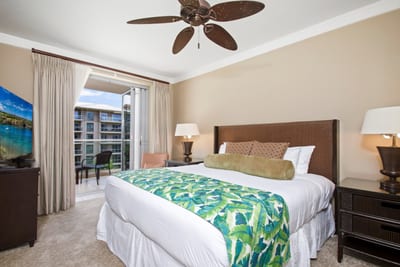 Tropical-inspired bedroom with balcony access and relaxing resort-style comfort. HKH-545