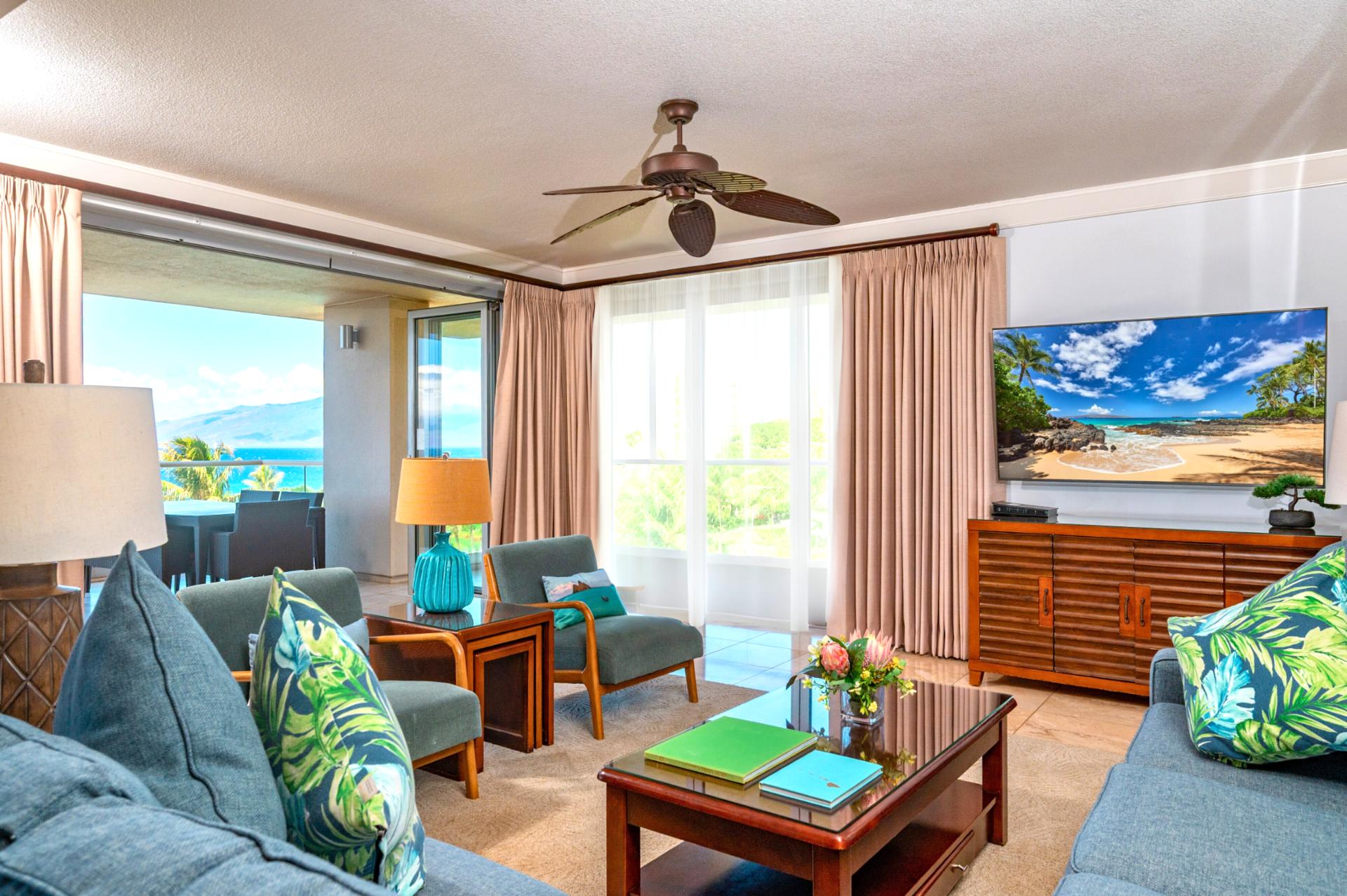 Spacious living area opens fully to the lanai, creating seamless indoor-outdoor living.