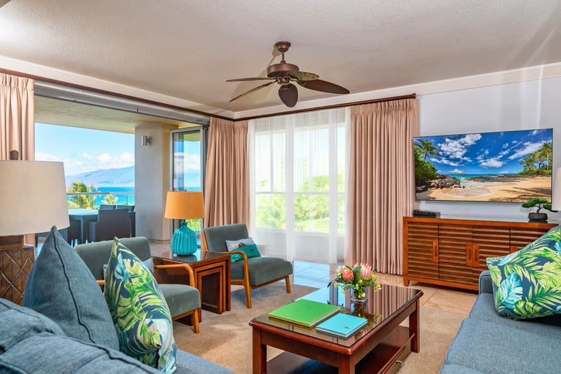 Spacious living area opens fully to the lanai, creating seamless indoor-outdoor living.