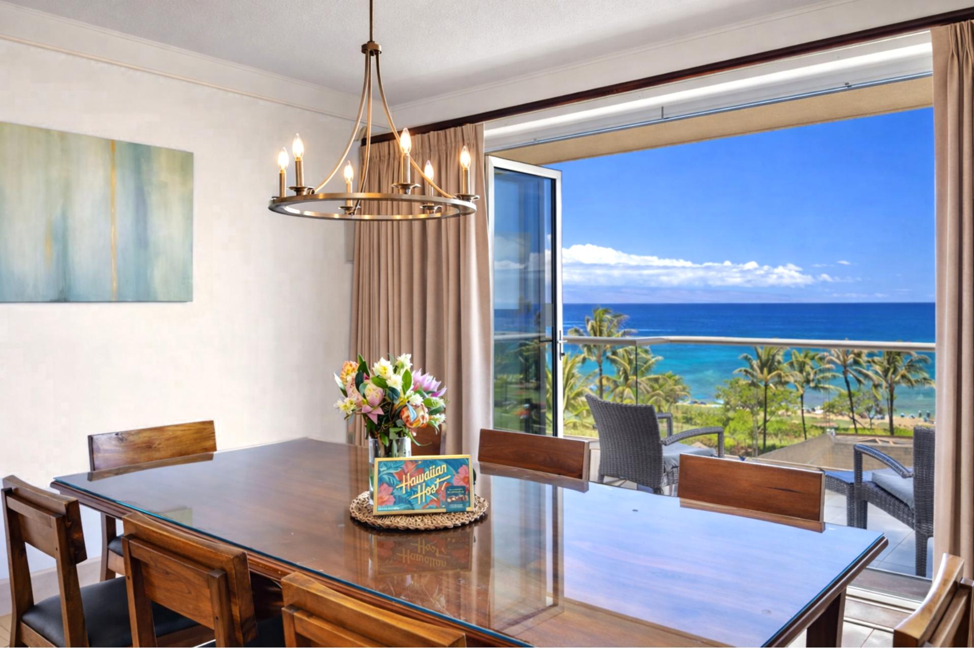 Bright dining area with ocean views—perfect for gathering after a day at the beach.