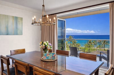 Bright dining area with ocean views—perfect for gathering after a day at the beach. HKH-550
