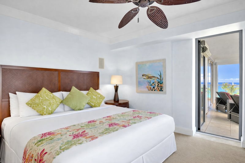 Ocean-facing bedroom with abundant natural light and tropical breezes.