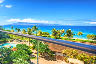 Sweeping fifth-floor views across the inner courtyard, pools, and sparkling Pacific. HKH-550