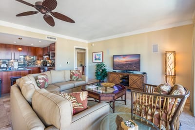 Gather for game nights and movie marathons in this breezy living room that opens to the lanai HKH-603