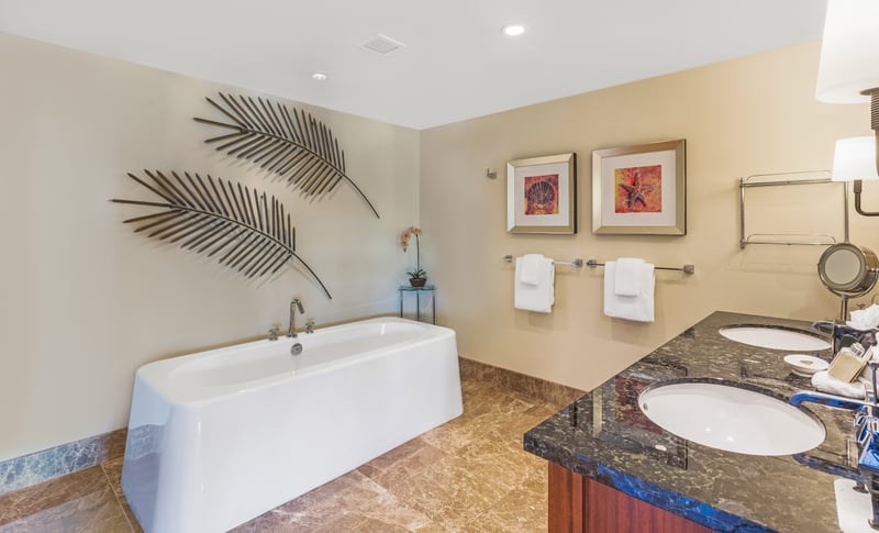 Sparkling guest bath with soaking tub and shower makes rinsing off the day effortless