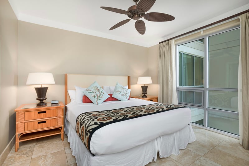 Relax in island-inspired bedroom with plush pillows and coastal tranquility. HKH-609