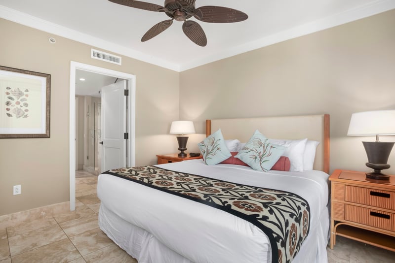 Cozy island bedroom with spa access, tropical pillows, peaceful ambiance. HKH-609