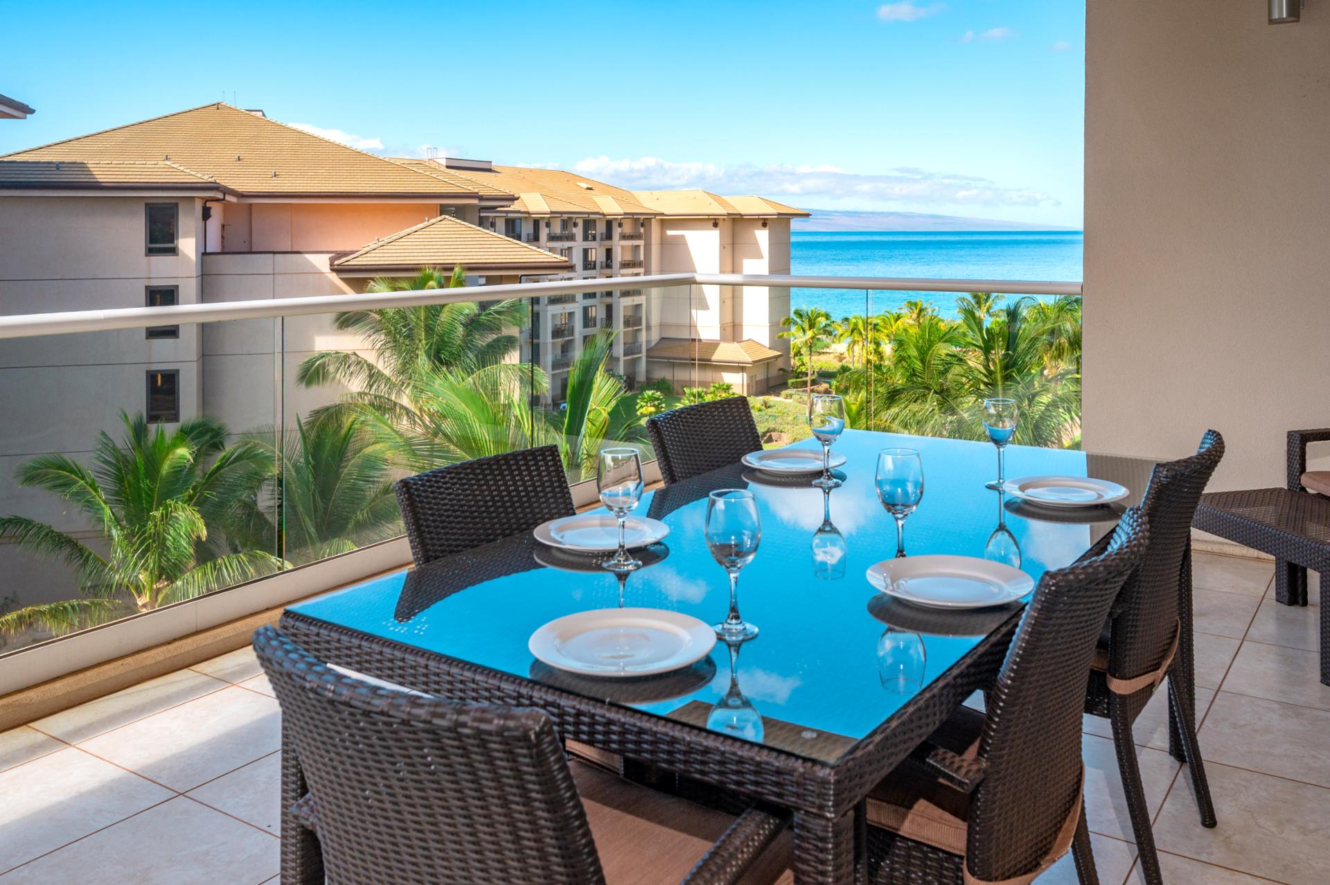 Dine al fresco with ocean views and gentle island breezes on your private lanai — Maui living at its finest.