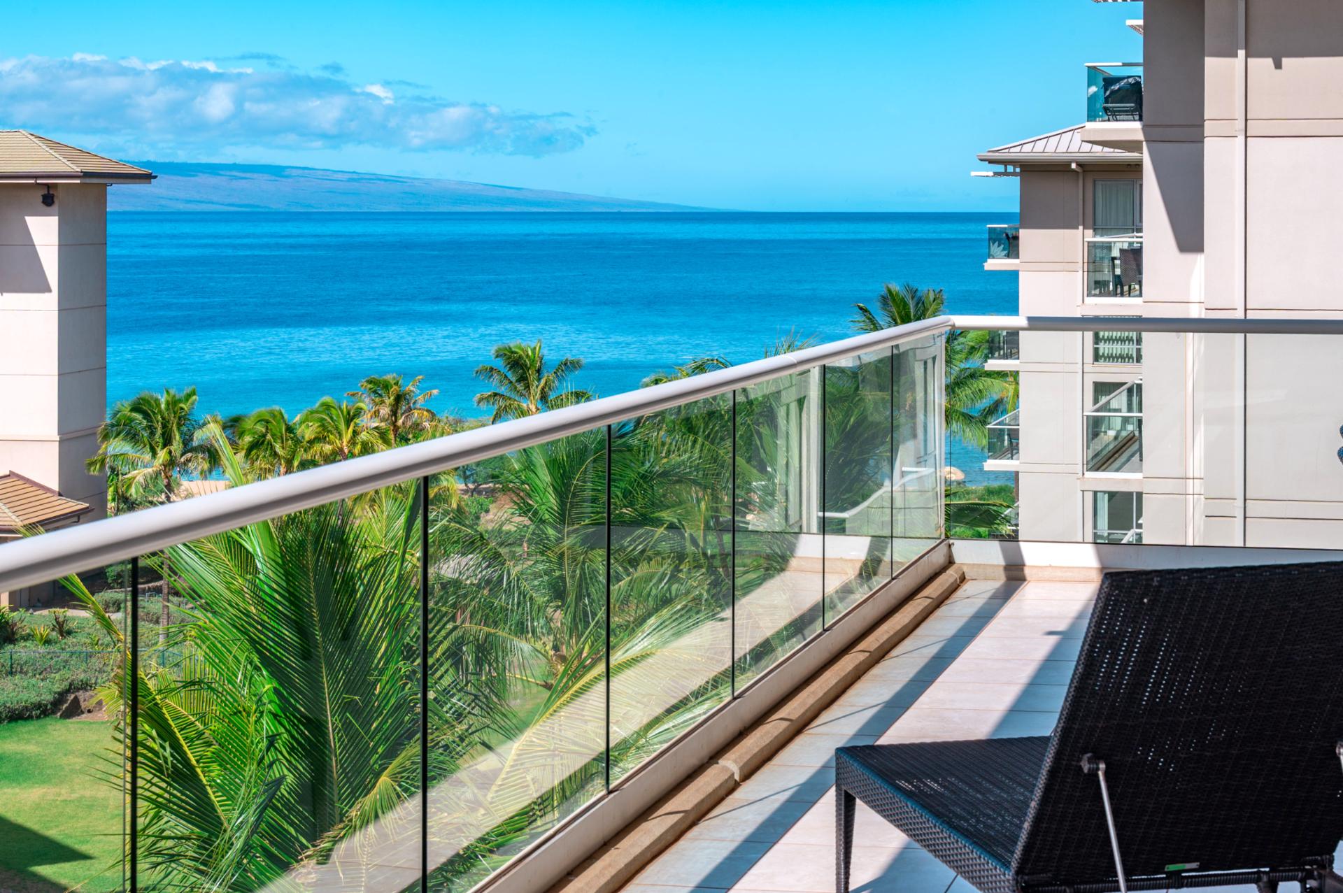 Relax on your private lanai and take in breathtaking ocean views framed by lush palms and Maui’s crystal-blue waters.