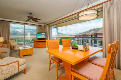 Spacious island retreat with dining, mountain views, and open lanai.