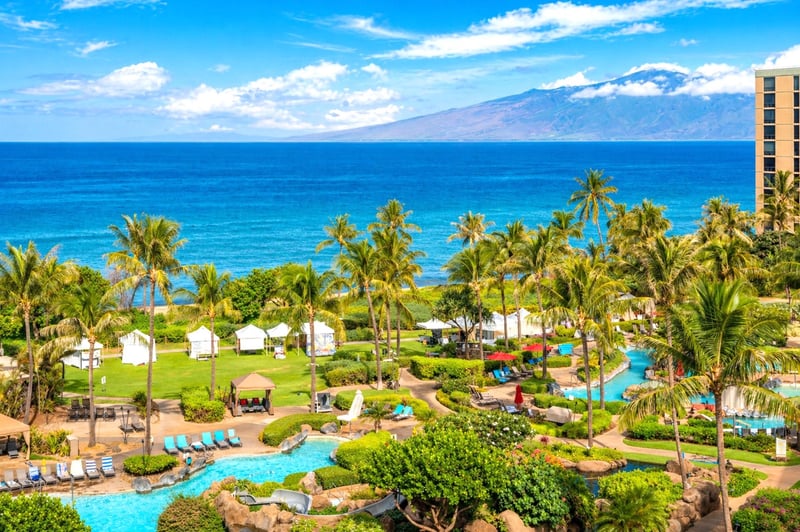Turquoise water and swaying palms frame the view from this Honua Kai perch