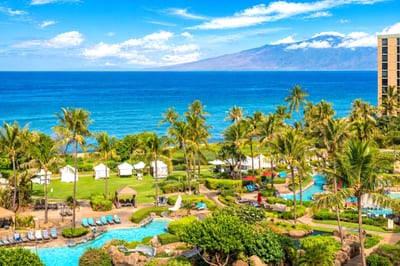 Turquoise water and swaying palms frame the view from this Honua Kai perch