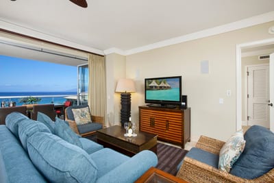 Sink into plush comfort with the ocean as your backdrop
