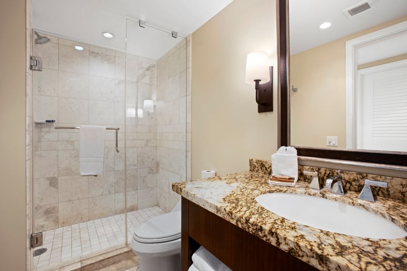 Get ready for your island adventures in this spacious guest bath 