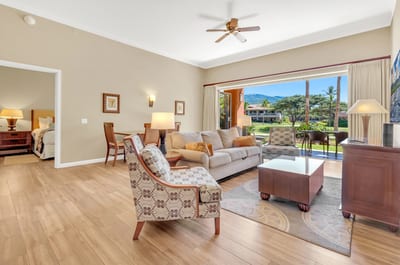 Bright, open living room with tropical views and elegant comfort.