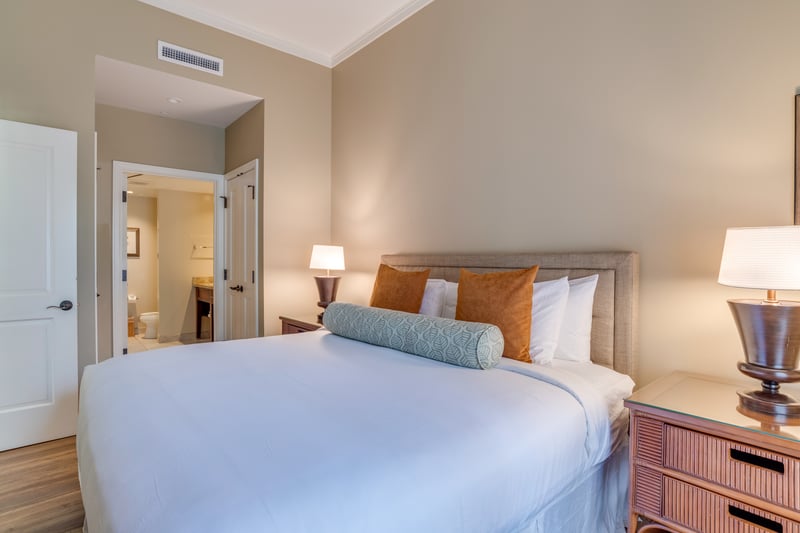 Cozy bedroom retreat with modern décor and warm ambient lighting.