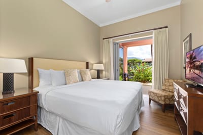 Wake up to paradise—luxurious comfort meets tropical garden views.